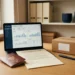 Polish passport and business registration document on desk beside laptop showing e-commerce dashboard and small labeled shipping box.